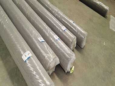 Several rolls of metal coil drapery was wrapped by the plastic film.
