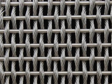 A piece of cable metal mesh with round wire and single row cable steel wire.