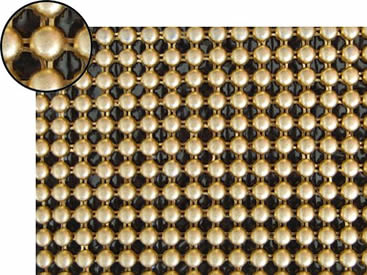 A piece of metallic fabric cloth with round shape and dull polished brass colors.
