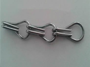 A small line of stainless steel aluminum chain curtain on the gray background.